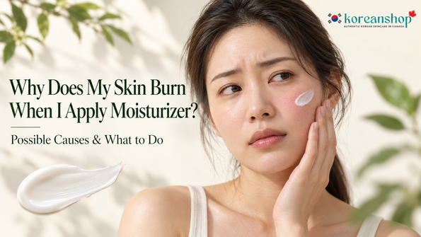 Woman touching her mildly irritated cheek after applying moisturizer, illustrating moisturizer burning.